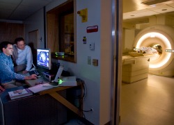 Physicians and patient in MRI