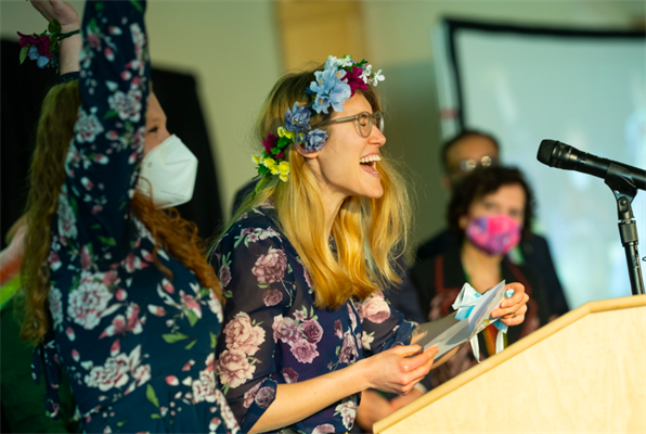 Match Day 2022 - woman announcing her match at lectern Match Day 2022 - woman announcing her match at lectern
